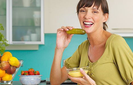 woman_eating_cucumber.jpg woman_eating_cucumber.jpg